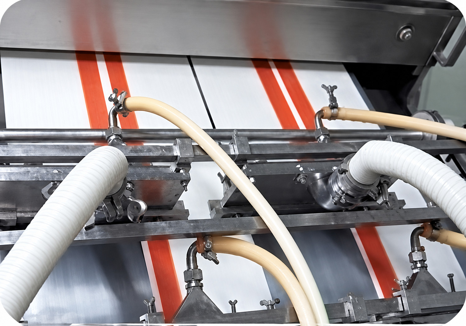 Close-up of conveyor and processing components on a YUKE crab stick line